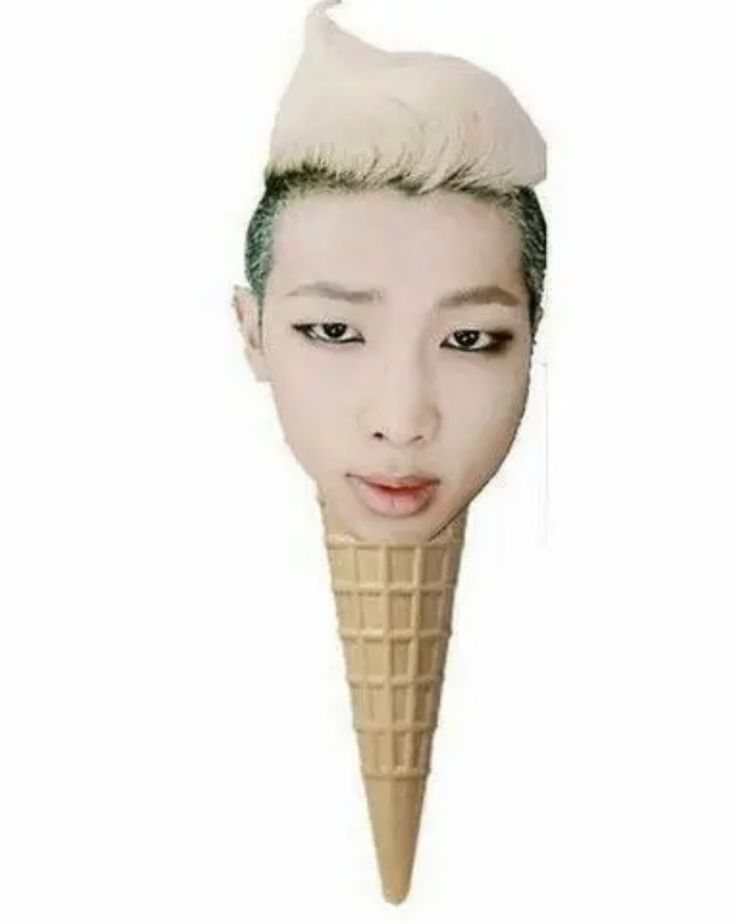 an ice cream cone with a woman's face in it, and the top half of her head is white