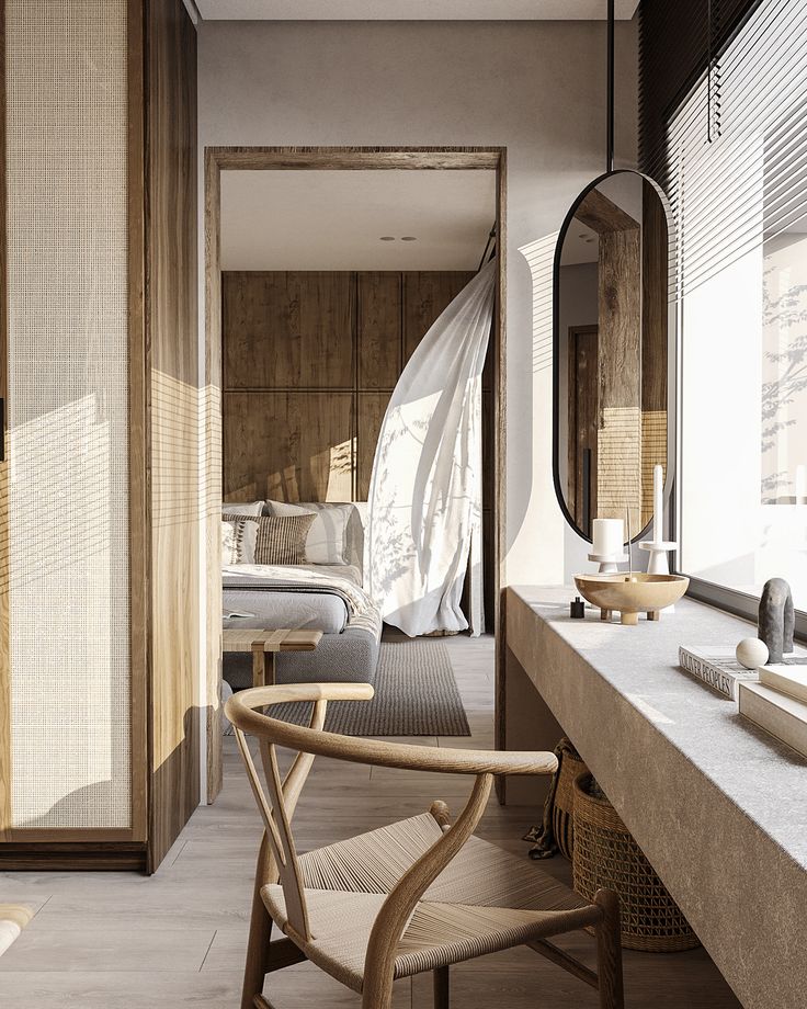 a chair sitting in front of a bathroom mirror next to a sink and counter top