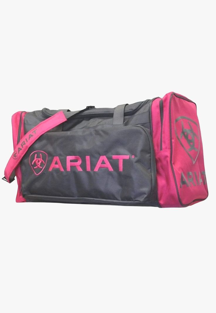 Take on any adventure with the Ariat Junior Gear Bag. Featuring multiple compartments, a detachable shoulder strap and heavy duty fabric to maximise durability and protection. Junior gear bag Heavy duty poly fabric Detachable shoulder strap  Heavy duty zippered end pockets Top zip opening to the main compartment  H11" Saddle Cover, Safety Helmet, Gear Bag, Saddle Pads, Orange Bag, Pocket Top, Leather Care, Pink Bag, Travel Bags