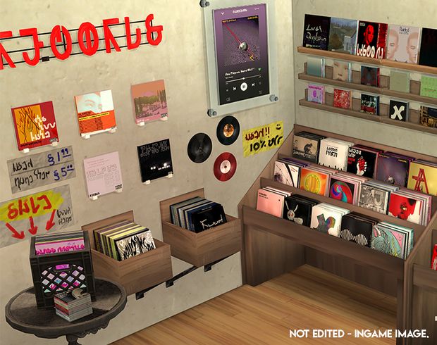 a room filled with lots of different types of books and records on the wall next to a table