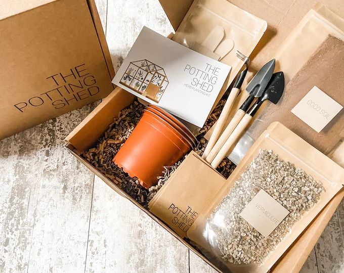 an open box containing spices and utensils