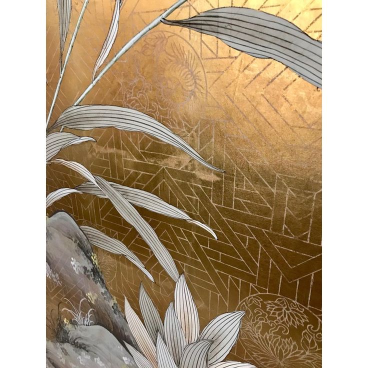 an artistic painting with gold and silver colors