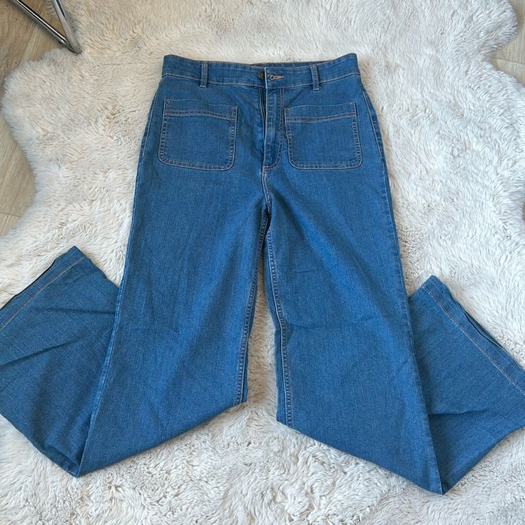 Never Worn Denim Pants, Trouser Style, With From Pockets, Nice Fit Retro Denim Bottoms For Workwear, Retro Denim Workwear Bottoms, Retro Flare Jeans For Workwear, Blue High-waisted Flare Jeans With Pockets, High Waist Retro Denim Pants, Retro High-waist Jeans For Workwear, Retro High Waist Jeans For Work, Retro High-waist Denim Pants, Retro High Rise Jeans For Workwear