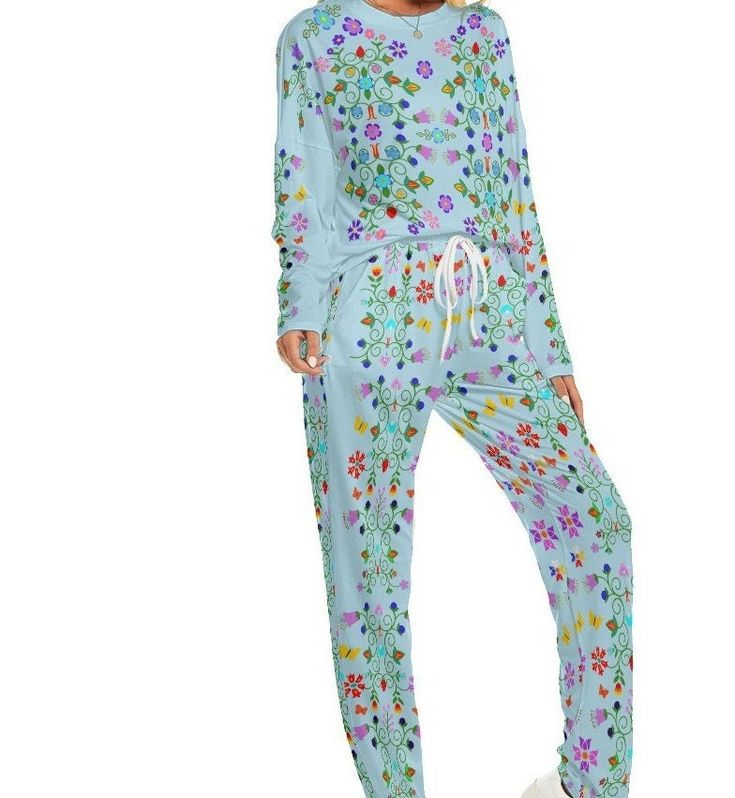 Floral Women's Pajama Set Suitable to be worn at home, with soft and comfortable fabric Fabric: 88% polyester and 12% spandex Regular fit Drop shoulder, long sleeve, crew neck, suits of T-shirt and pants Care Instruction: machine wash cold with similar colors, do not bleach, tumble dry low, do not iron, do not dry clean. This product is made on demand Winter Sets With Relaxed Fit And Long Sleeves, Relaxed Fit Long Sleeve Winter Sets, Winter Long Sleeve Relaxed Fit Sets, Comfortable Long Sleeve Winter Sets, Casual Blue Long Sleeve Sets, Multicolor Long Sleeve Sleepwear For Lounging, Long Sleeve Pajama Party Sets For Fall, Long Sleeve Pajama Sets For Fall, Casual Printed Long Sleeve Sleepwear