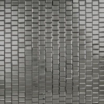 a close up view of a wall made out of metal tiles, with no one in it