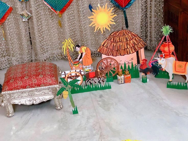 an elaborately decorated bed and table in front of a curtained wall with decorative items on it