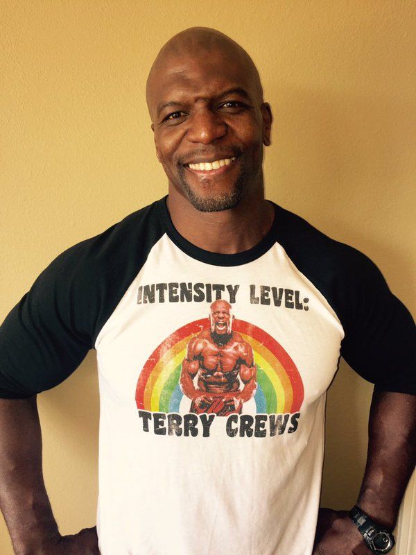 a man wearing a shirt that says intensity level terry crews