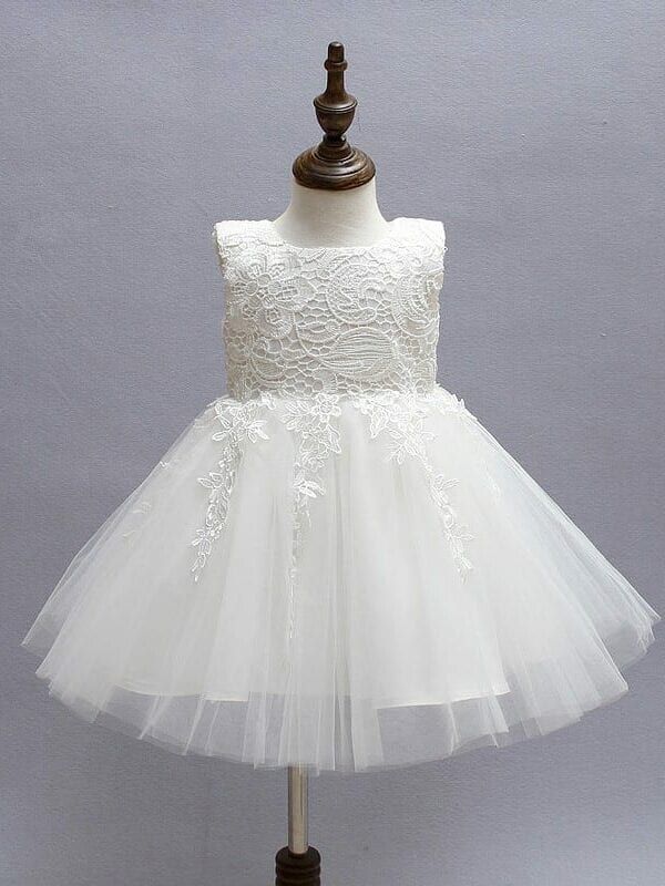 Ivory Tulle Lace Flower Girl Dress Spring White Tutu Dress With Lace Bodice, Summer Cream Tulle Princess Dress, Cream Sleeveless Princess Dress For Baptism, Sleeveless Lace Bodice Princess Dress For Baptism, Sleeveless Princess Dress With Lace Bodice For Baptism, Elegant White Lace Tutu Dress, Cream Princess Style Sleeveless Baptism Dress, Baptism Princess Dress With Lace Bodice And Sleeveless Design, Sleeveless Princess Dress With Lace Trim For Baptism