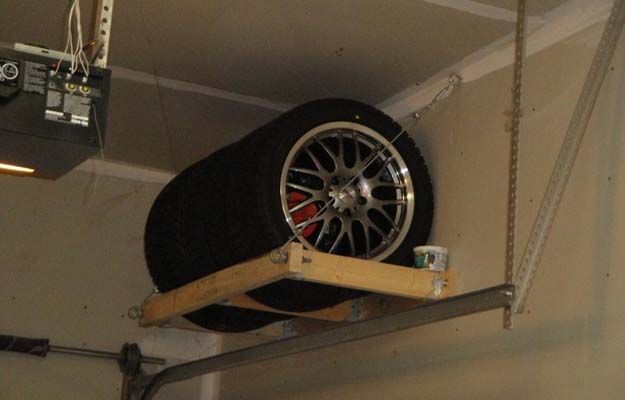 a car tire is suspended from the ceiling