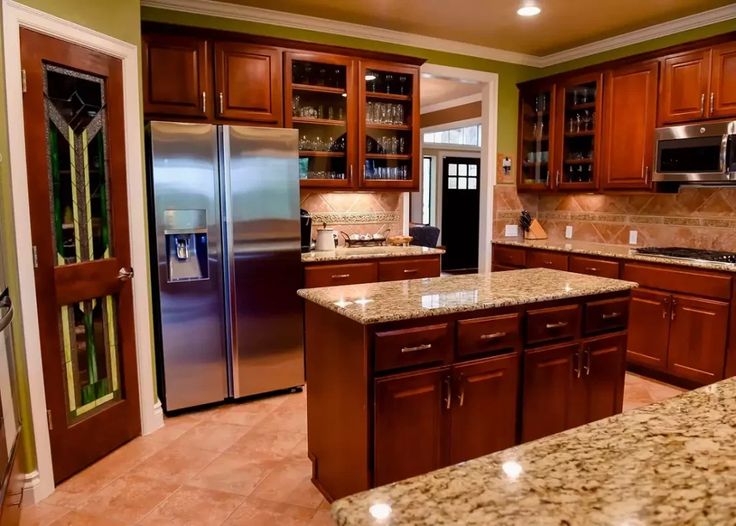 Installing glass inserts Update Cherry Cabinets, Dark Cherry Cabinets Kitchen, Cherry Wood Kitchen Cabinets, Maple Wood Flooring, Cherry Wood Kitchens, Cherry Wood Cabinets, Laminate Flooring Colors, Casual Kitchen, Best Laminate