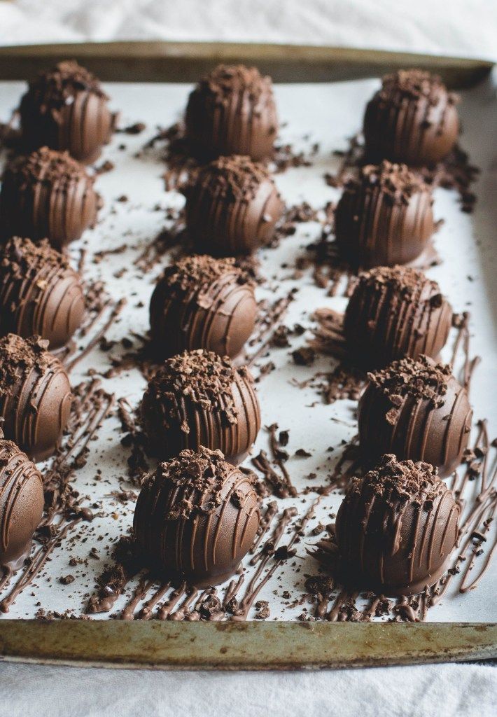 chocolate truffles on a baking sheet ready to be eaten