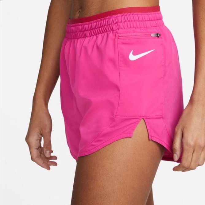 Built In Brief For Enhanced Coverage Expandable Center Front Waistband Size Medium Nike Sporty Beach Shorts, Nike Athleisure Beach Athletic Shorts, Nike Running Shorts For Summer, Nike Athleisure Athletic Shorts For Beach, Nike Athletic Shorts For Running In Summer, Nike Training Bottoms For Summer, Nike Bottoms For Summer Training, Pink Sports Shorts With Pockets, Nike Athletic Shorts With Elastic Waistband For Beach