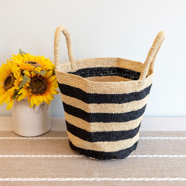 IN STOCK NOW SHIPPING FROM LOS ANGELES Add some summer vibes to your wardrobe with Elena Handbags' Raffia Basket Bag. Perfect for a day at the beach or a summer picnic, this bag features a stylish striped design and is made from durable and lightweight raffia material. Stay on trend and stand out with this must-have summer fashion accessory! Natural Soft Raffia Straw Handmade Size: 9"H x 14"W x 7"D Designer Style ID: 8652 Black Bucket Shaped Bag For Summer, Bucket Shaped Beach Bag For Everyday Use, Chic Bucket Bag For Picnic, Black Summer Bucket Bag For Vacation, Everyday Use Bucket Beach Bag, Everyday Bucket Beach Bag For Beach Season, Bucket Shaped Beach Bag For Beach Season, Black Bucket Shape Straw Bag For Summer, Woven Bucket Beach Bag For Travel