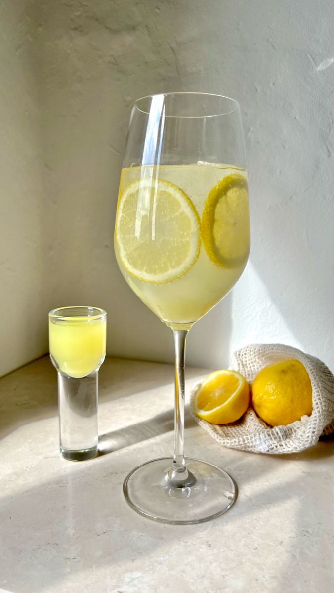 Limoncello spritz aesthetic. Whole lemons. Wine glass. Summer drink. Foodie. Spritz Aesthetic, Limoncello Spritz, Bbq Burgers, Lemon Candle, Lemon Drink, Birthday Drinks, Sicilian Lemon, Alcohol Aesthetic, Candle Aesthetic