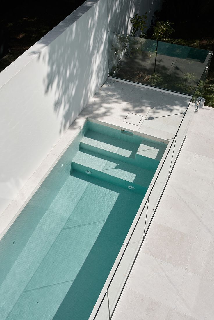 an empty swimming pool is shown from above