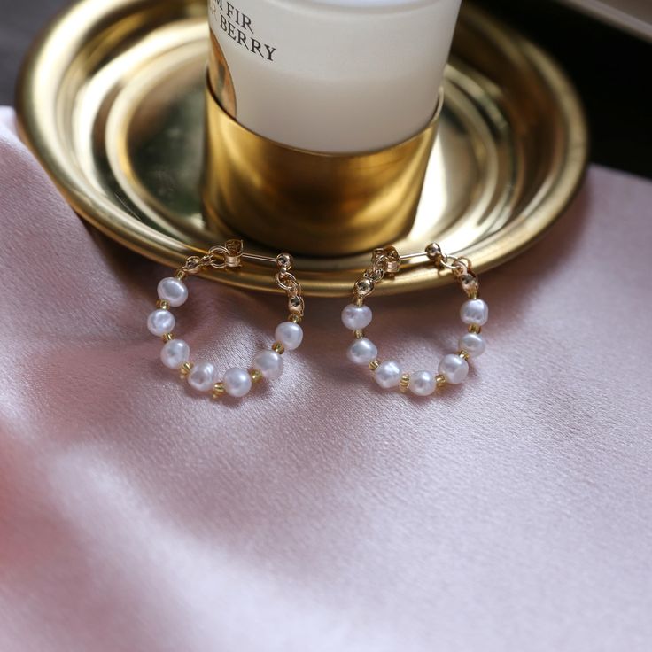 Add a touch of elegance to any outfit with these stunning pearl hoop earrings, featuring natural baroque pearls in an exquisite ivory-to-pink hue. Their gentle, shimmering luster brings a radiant, classy look, while the 14K gold-plated parts add a dainty and shiny touch. These real pearl earrings are lightweight and comfortable, making them perfect for everyday wear or as art deco bride accessories. Whether you're dressing up for a party, wedding, graduation ceremony, or just want a sophisticate Gift Pearl White Hoop Earrings With Pearl Chain, White Pearl Charm Hoop Earrings, Pearl White Hoop Pearl Earrings, Pearl White Hoop Earrings With Pearl Chain For Gift, Pearl White Pearl Hoop Earrings, Pearl White Hoop Earrings, Pearl Pendant Hoop Earrings Gift, White Pearl Hoop Earrings With Pearl Charm, White Hoop Earrings With Pearl Chain For Gift