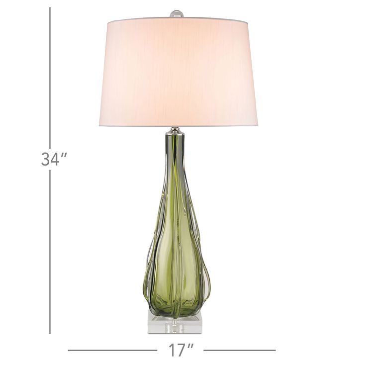 The Zephyr Table Lamp features an Off White shantung shade and a Green glass body. One 150 watt max 120 volt A19 medium base bulb is required, but not included. 17 inch width x 34 inch height. UL listed. Transitional Chandeliers, Flush Mount Lights, Hand Forged Iron, Forged Iron, Hand Carved Wood, Incandescent Bulbs, Lighting Collections, Green Glass, Shades Of Green