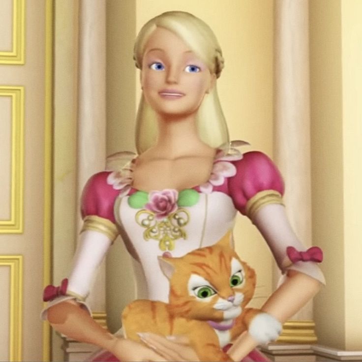 a woman in a pink dress holding a cat