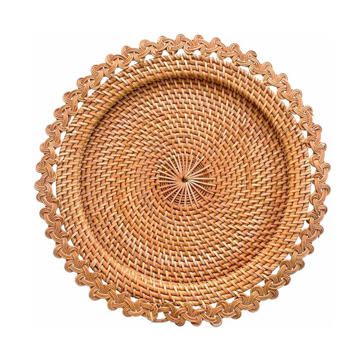 a round woven tray with an intricate design on the bottom and sides, made out of wicker