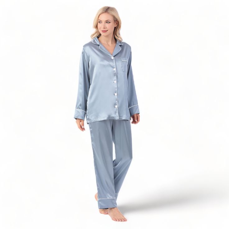 Indulge in ultimate comfort with the luxurious PearlSilk™ Pajama Set. Made from high-quality vegan silk satin, this 2-piece ensemble is cool, breathable, and exquisitely soft and silky to the touch. Enjoy a blissful sleep that is free of discomfort, with less sweating and hot flashes. Perfect for restful slumber, the PearlSilk™ pajama set is the ultimate in attainable luxury & comfort. Tired of pajamas that don’t look flattering nor feel great? Too many times we find ourselves wearing clothes at Elegant Satin Loungewear, Elegant Satin Sleepwear For Lounging, Elegant Silk Sleepwear With Relaxed Fit, Elegant Solid Color Sleepwear With Relaxed Fit, Elegant Solid Color Relaxed Fit Sleepwear, Elegant Solid Color Relaxed Fit Set, Elegant Silk Sleepwear For Relaxation, Elegant Blue Sets For Pajama Party, Elegant Blue Pajama Party Sets