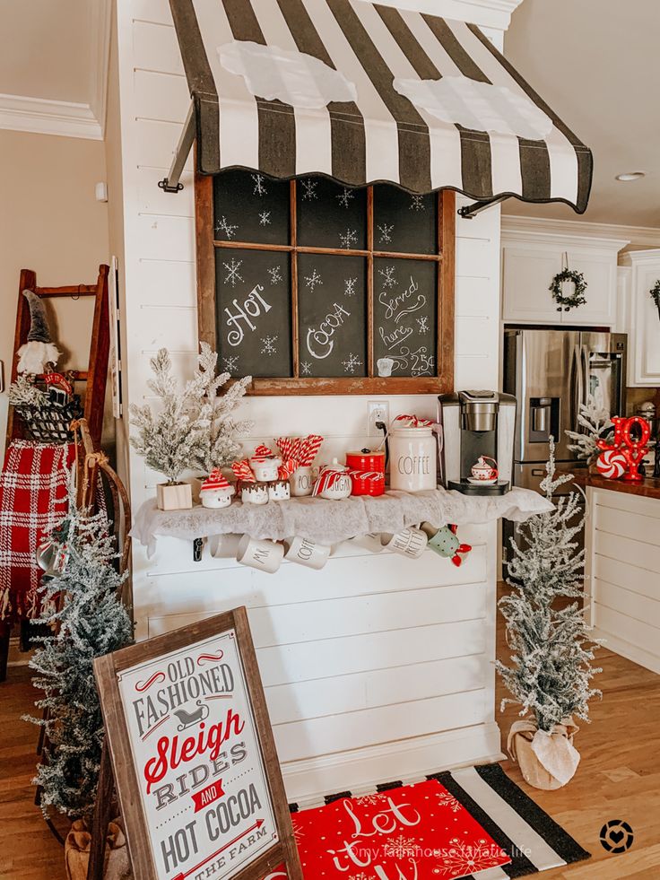 a decorated christmas kitchen with chalkboard menus