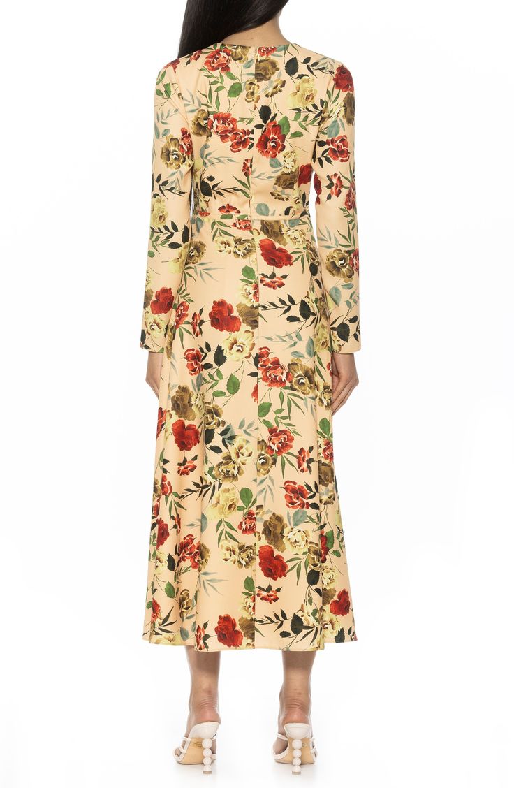 Delicate bows add darling detail to a modest long-sleeve dress featuring a midi-length skirt and bright blossom print. 52 1/4" length (size 2) Hidden back zip closure Long sleeves 100% polyester Machine wash, line dry Imported Modest Fitted Floral Maxi Dress, Printed Maxi Dress For Spring, Beige Long Sleeve Maxi Dress For Spring, Fall A-line Maxi Dress For Brunch, Modest Fitted Floral Dress For Spring, Modest Floral Dress For Spring, Modest Floral Print Maxi Dress For Spring, Chic Long Sleeve Maxi Dress For Garden Party, Beige Long Sleeve Maxi Dress For Garden Party