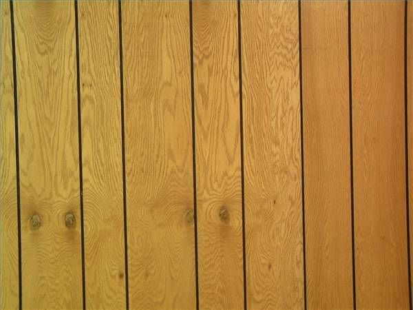 wood planks are lined up against the wall