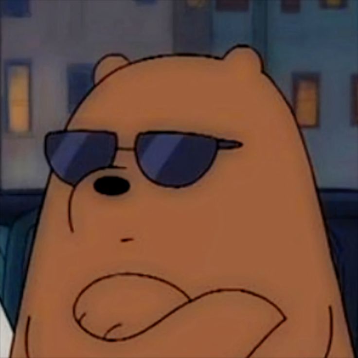 a cartoon bear wearing sunglasses and sitting in a car