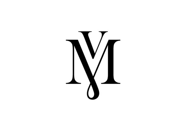 the letter m is made up of two letters, one in black and white with an elegant