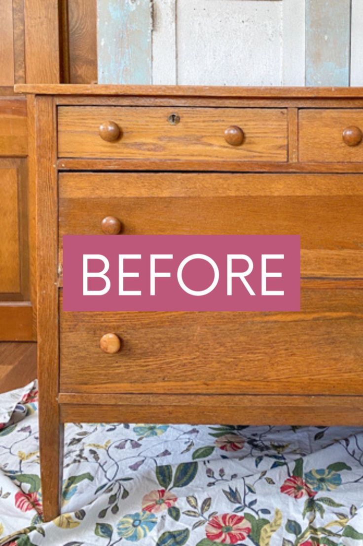 a wooden dresser with the words before painted on it's front and side panels