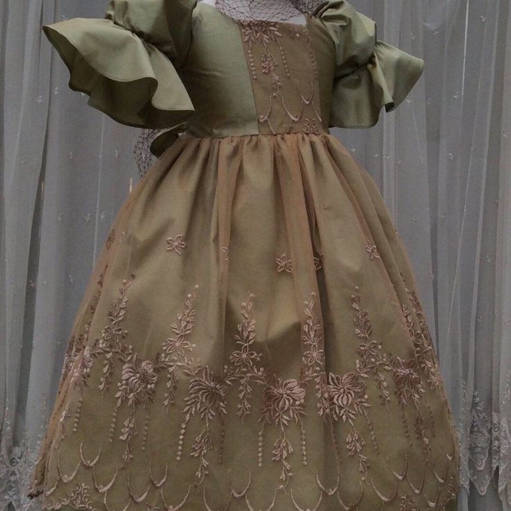 Silk Victorian Dress With Puff Victorian Sleeves And A Beautiful Lace Embroidery Over Lace Skirt With Attached Crinoline For Fullness, Fully Lined. Hair Piece Sells Separately Green Embroidered Dress For Dress-up, Elegant Embroidered Fitted Princess Dress, Green Embroidered Dress For Dress-up Occasions, Princess Style Ruffled Holiday Dress For Pageant, Princess Style Holiday Dress With Ruffles For Pageant, Festive Fitted Princess Dress With Ruffles, Festive Princess Dress With Ruffles, Green Christmas Princess Dress With Ruffles, Festive Holiday Dress With Ruffles