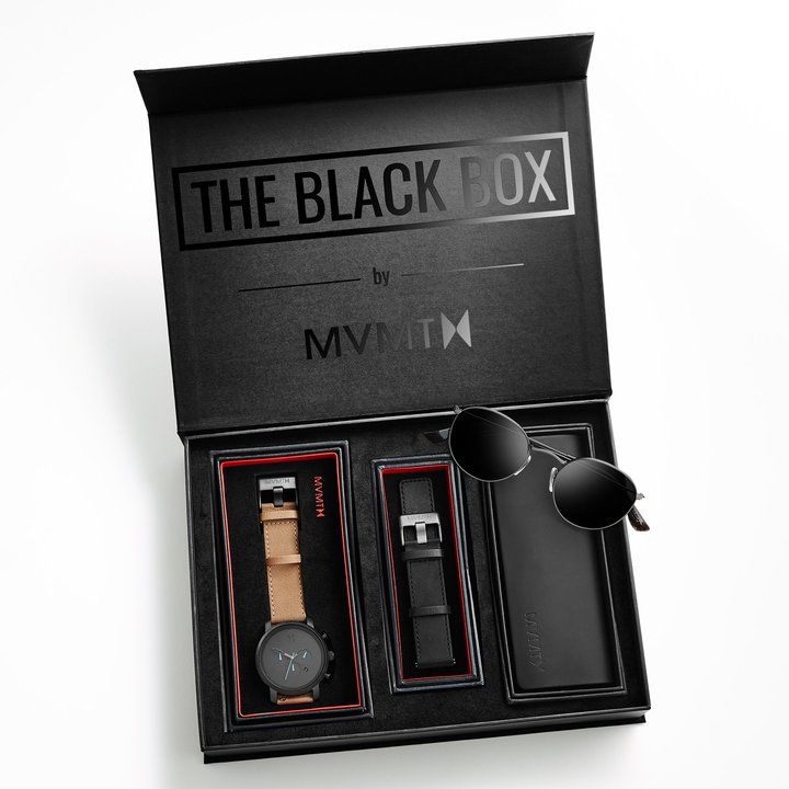 the black box is packed with three watches and two pairs of eyeglasses on it