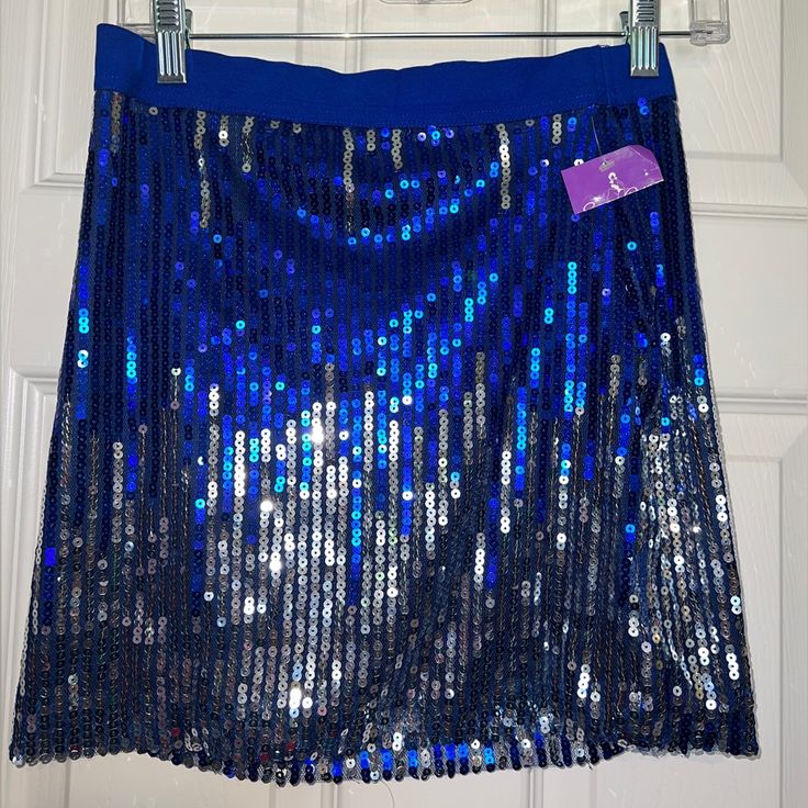 New! Shimmery Royal Blue And Silver Sequins Pop In This Stretchy Miniskirt. Bundle With Other Items In My Closet To Save On Shipping. Get It Before It’s Auctioned In My Live Shows Or Follow Me To Attend A Live Show. Find And Like My Live Show Post In My Closet To Get Notifications Of My Live Shows. Blue Lined Skort For Party, Party Blue Lined Skort, Blue Sequined Bottoms For Party Season, Blue Sequined Stretch Bottoms, Blue Sequined Mini Skirt For Spring, Blue Mini Skirt For Party Season, Blue Sequin Skirt For Night Out, Blue Fitted Sequin Skirt, Fitted Blue Sequin Skirt