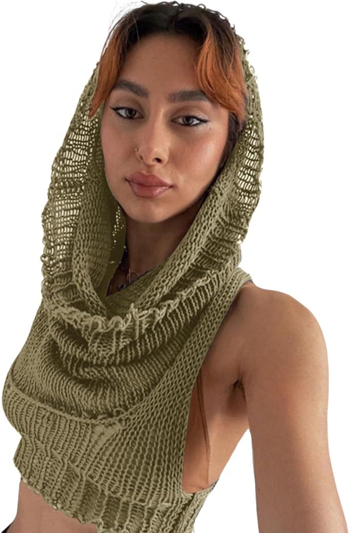 a woman wearing a green knitted scarf