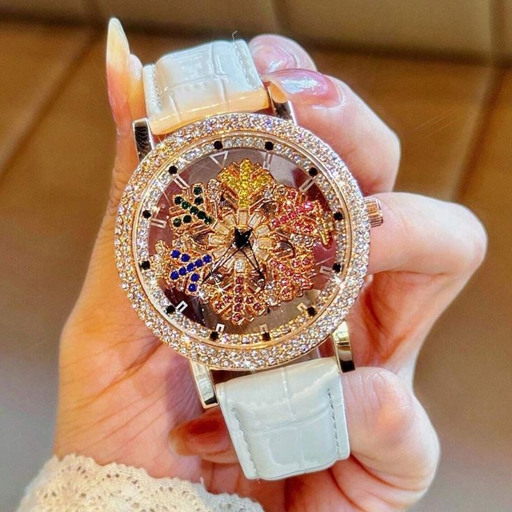 Colorful Diamond Rhinestone Rotation Snowflake Dial Design Fashion Wrist Skeleton Watch With Visible Transparent Back * Fashion Watch * Color: Multicolored * Rhinestone, Crystal, Stainless Steel * Round Shape * Pu Leather * Water Resistant (30m) * Mineral Glass * Rhinestone Scale Diamond White Watches With Rhinestones For Gift, Gift Watches With Crystal And Rhinestones, Diamond White Rhinestone Watch For Gift, Diamond White Watch With Rhinestones As Gift, Rose Gold Diamond Watch With Rhinestones For Gift, Round Crystal Watch As Gift, Rose Gold Watch With Rhinestones As Gift, Crystal Watch As A Gift, Rose Gold Watches With Rhinestones For Gifts