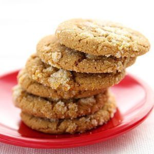 a stack of cookies sitting on top of a red plate