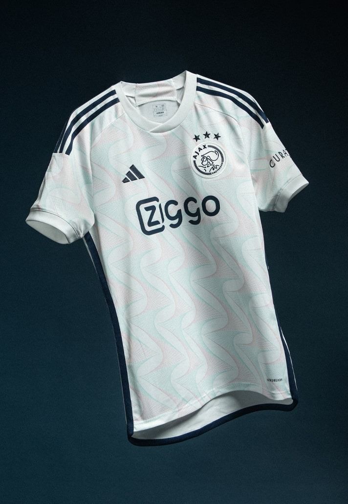 a soccer jersey hanging on a clothes line