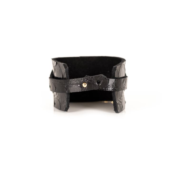 Leather bracelet made of two layers of premium black Italian leather. The Buckle Black Leather Cuff has an adjustable double-snap closure. This unique artisanal handmade cuff is a distinctive fashion statement to any wardrobe. This bracelet is a great gift for women. DETAILS 1.57" width 7" length Double Snap Closure Black Gold Plated Buckle 100% genuine Italian Leather Handmade Made in USA Leather Cuff Wristband With Bracelet Strap, Leather Bracelets With Wrist Strap As Fashion Accessory, Black Luxury Leather Bracelet For Everyday, Chic Adjustable Leather Bracelet, Leather Double Band Bracelet With Leather Strap, Black Leather Band Bracelet, Modern Leather Strap Cuff Bracelet, Modern Leather Cuff Bracelet, Adjustable Leather Cuff Bracelet With Bracelet Strap