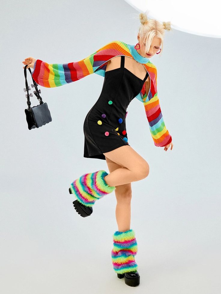 a woman in black dress and multi colored socks