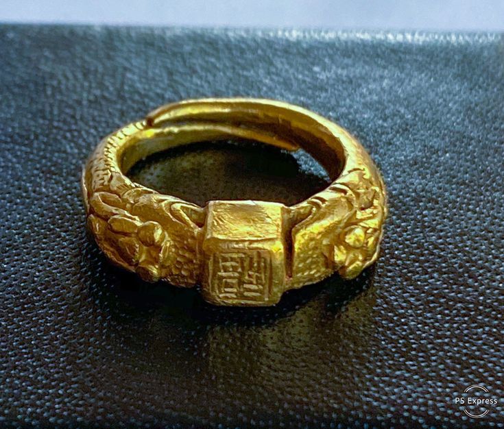 "Offered is a very old and quite rare Chinese 24k double Dragon Ring. Pre 18th century...probably Ming Dynasty. Hand carved with finely detailed double dragons and chinese calligraphy on the ring as well as on the shank. This ring has been in a case for well over 40 years, I have rarely handled it, in order to avoid causing further wear to the dragons and other details. An incredible piece of Chinese history. Weight 7.8g Metal - 24k High Karat Gold (verified) Hallmarks - Chinese Characters insid Ancient Yellow Gold Jewelry For Collectors, Ancient Style Collectible Yellow Gold Rings, Ancient Style Collectible Yellow Gold Jewelry, Collectible Ancient Style Yellow Gold Jewelry, Gold Vintage Jewelry For Formal Occasions, Ancient Yellow Gold Jewelry For Ceremonial Occasions, Ancient Style Yellow Gold Ceremonial Jewelry, Ancient Style Yellow Gold Jewelry For Ceremonial Occasions, Antique Engraved Open Ring For Ceremonial Occasions