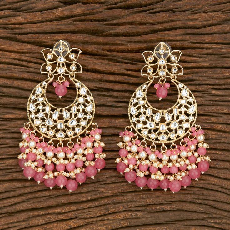 The Pink Mihika Earrings are stunning Earrings with Kundan and Gold Plating with Pink Beads. Specifications Materials used: Gold-Plating, Kundan, Pink Beads At Romikas, we pride ourselves on the craftsmanship and high quality of our jewelry, designed to enhance your natural beauty. Please contact us with any questions. Pakistani Earrings, Fancy Jewellery Designs, Indian Jewellery Design Earrings, Earrings Indian, Indian Wedding Wear, Indian Jewellery Design, Bollywood Jewelry, Earring Trends, Jewelry Accessories Ideas