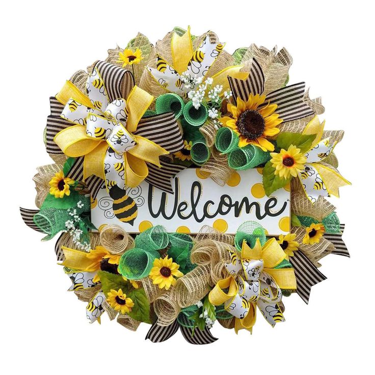 a welcome wreath with sunflowers and ribbon around it that says, welcome on the front