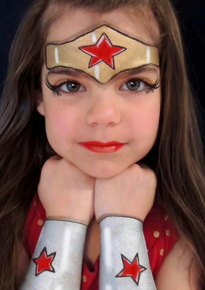 Wonder Woman face painting. Face Painting Ideas For Kids, Superhero Face Painting, Cowgirl Halloween Costumes, Painting Ideas For Kids, Face Painting Ideas, Comic Party, Girl Face Painting, Cowgirl Halloween, Face Painting Easy