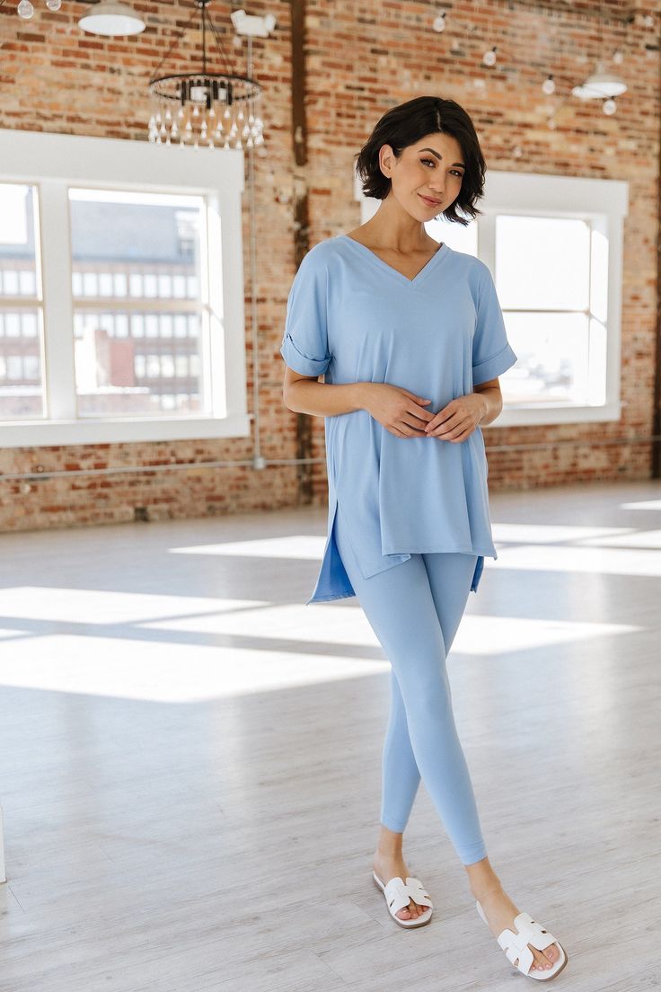 There are so many things we love about our Evalee Microfiber Loungewear Set! The top features an oversized fit with a v-neck and cuffed sleeves, while the bottoms are fitted with a high elastic waistband! The microfiber fabric makes our set stretchy and so soft, it will quickly be your favorite outfit! Our monochrome set comes in so many fun colors and sizes you're sure to find the perfect one for you! Model Info: Models are 5'7", Size 2, wearing smalls Fabric: 90% Polyester, 10% Spandex V-neck Athleisure Activewear For Loungewear, Spring V-neck Activewear For Yoga, Solid V-neck Activewear For Spring, Casual Relaxed Fit V-neck Activewear, Stretch V-neck Activewear For Pilates, Spring V-neck Yoga Activewear, Spring Yoga Activewear V-neck, Spring Athleisure Tops With Elastic Waistband, Sporty V-neck Tops For Loungewear