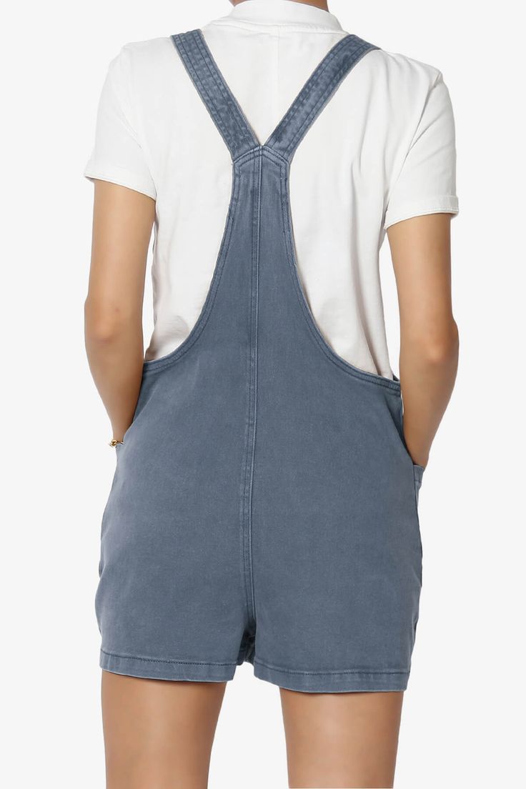 Embrace effortless style with our Washed Denim Shortall, featuring adjustable straps for a perfect fit.Ideal for casual outings, this relaxed-fit short overall pairs classic charm with modern streetwear vibes.Crafted from a soft cotton blend twill, it offers comfort for all seasons. Equipped with handy pockets, it's perfect for lounging or a trendy street look short playsuit.Pair with a simple tee and sneakers for an edgy remix suitable for everyday casuals, weekend jaunts, or vacation lounging. Summer Medium Wash Overalls With Adjustable Straps, Summer Denim Overalls With Adjustable Straps, Summer Overalls With Adjustable Straps In Medium Wash, Medium Wash Overalls With Adjustable Straps For Summer, Summer Denim Blue Overalls With Adjustable Straps, Trendy Shortalls Overall With Pockets, Trendy Overalls Shortalls With Pockets, Casual Medium Wash Denim Overalls, Summer Cotton Denim Jumpsuit With Adjustable Straps