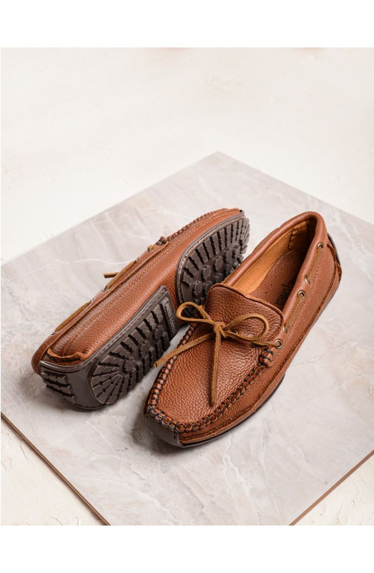 Double-layer moosehide defines a comfort-minded driving loafer paneled with soft leather. Leather upper and lining/rubber sole Imported Leather Moccasins With Moc Toe, Swift Leather Moccasins With Moc Toe, Brown Leather Moccasins With Suede Lining, Brown Moccasins With Textured Sole For Fall, Leather Moccasins With Rubber Sole And Moc Toe, Leather Moc Toe Moccasins, Fall Brown Moccasins With Textured Sole, Fall Plain Toe Moccasins With Stitched Sole, Swift Leather Moccasins With Moc Toe And Rubber Sole