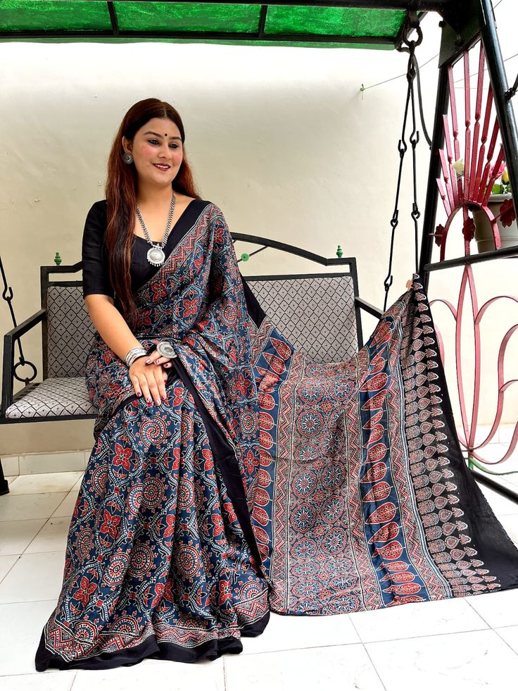 The exquisite beauty of Hand crafted Ajrak modal silk sarees are always unmatched and of profound quality. Try this out while stock lasts . Ajrakh Modal Silk Sarees, Silk Sarees Blouse, Modal Silk Sarees, Kochi India, Trendy Outfits Indian, Silk Saree Blouse, Blouse Material, Fashion Attire, Kochi