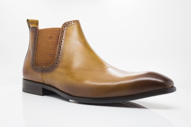 Style: 478-11-Cognac Stunning Burnished Calfskin slip-on Boot from the Carrucci collection features a Double Gore for a perfect fit and a clean welt! Elegant Brown Chelsea Boots With Brogue Detailing, Elegant Cognac Leather Slip-on Shoes, Elegant Cognac Slip-on Leather Shoes, Elegant Slip-on Chelsea Boots With Rubber Sole, Brown Chelsea Boots With Leather Footbed For Formal Occasions, Brown Chelsea Boots With Leather Sole For Work, Formal Brown Chelsea Boots With Leather Footbed, Elegant Cognac Leather Work Shoes, Elegant Cognac Leather Workwear Shoes