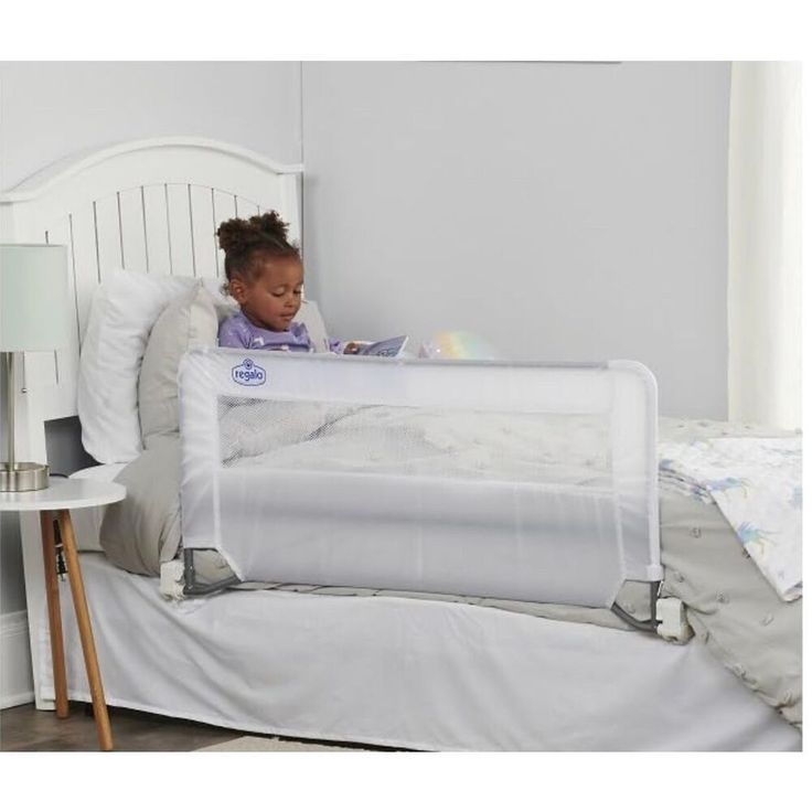 The Regalo Swing Down Bed Rail Keeps Your Child Safe As They Transition From A Crib To A Big Kid Bed. Designed With A Steel Frame And A Durable Nylon And Mesh Cover, The Bed Rail Measures 20” High And Extends To 43”. No Tools Are Required For Assembly And It Locks Into Place For Added Security. Our Patented Swing Down Feature Allows This Bedrail To Pivot Down And Out Of The Way When Getting In And Out Of Bed Or Removing Sheets Kids Bed Rails, Childrens Bed, Hideaway Bed, Bed Rails For Toddlers, Big Kid Bed, Rail Guard, Bed Rail, Queen Mattress Size, Bed Rails