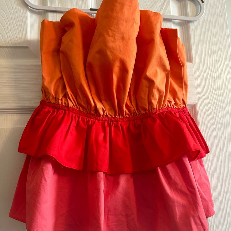 Do+Be Colorful Ruffle Sleeveless Top; Never Worn; Still Has Tags Strapless Ruffled Tops For Day Out, Pink Ruffle Hem Top For Summer, Pink Ruffle Hem Top For Vacation, Strapless Ruffle Top For Vacation, Pink Top With Ruffled Straps For Day Out, Strapless Ruffled Tops For Vacation, Beach Pink Top With Ruffle Hem, Summer Orange Top With Ruffles, Multicolor Sleeveless Top With Ruffles